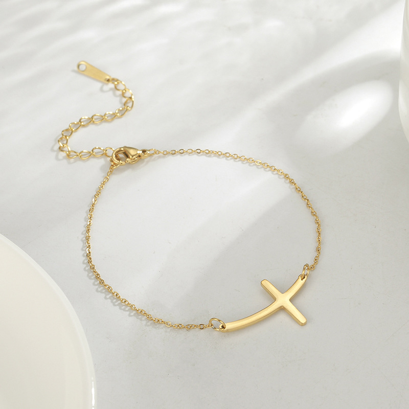 Bracelet croix courbée simple