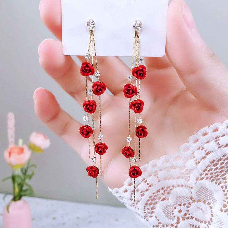 Boucles d'oreilles longues fleur rose strass rouge