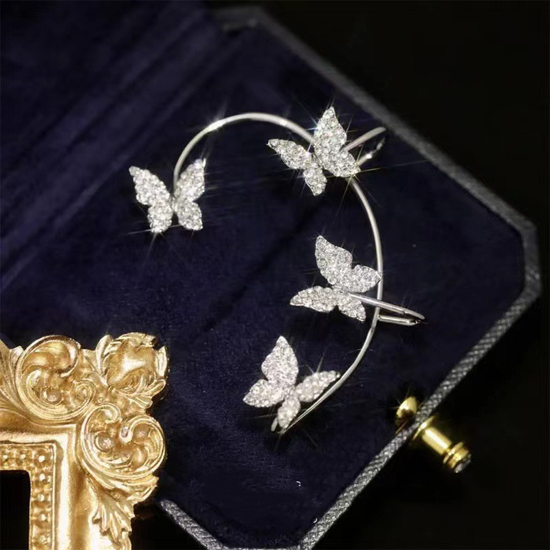 Boucle papillon bijou femme