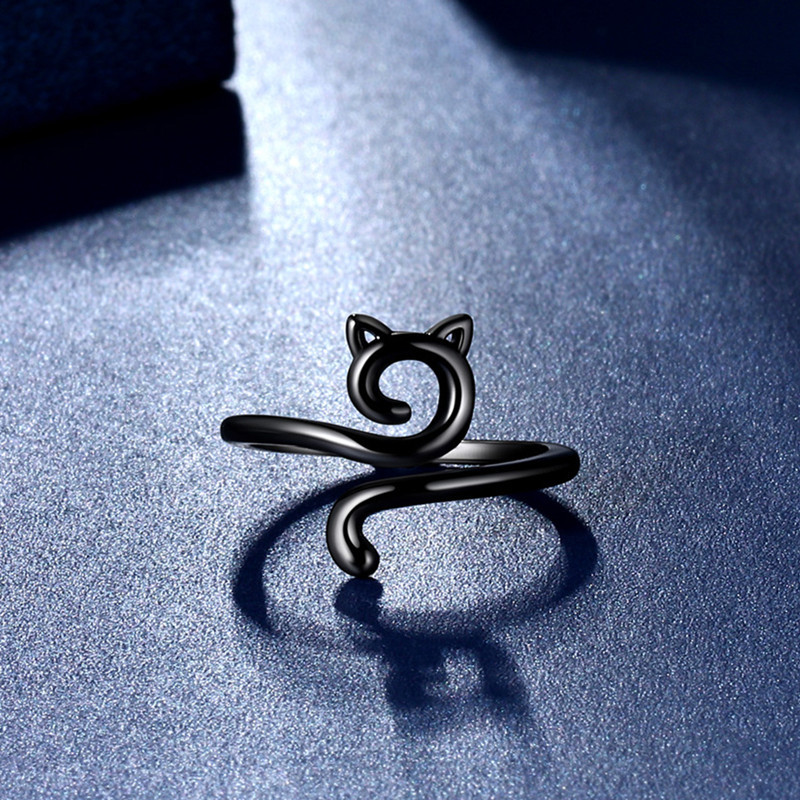 Bague chat géométrique ajustable ornement tricoté