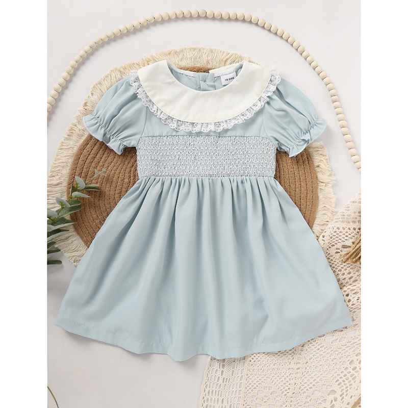 Robe smockée manches bouffantes dentelle fillette
