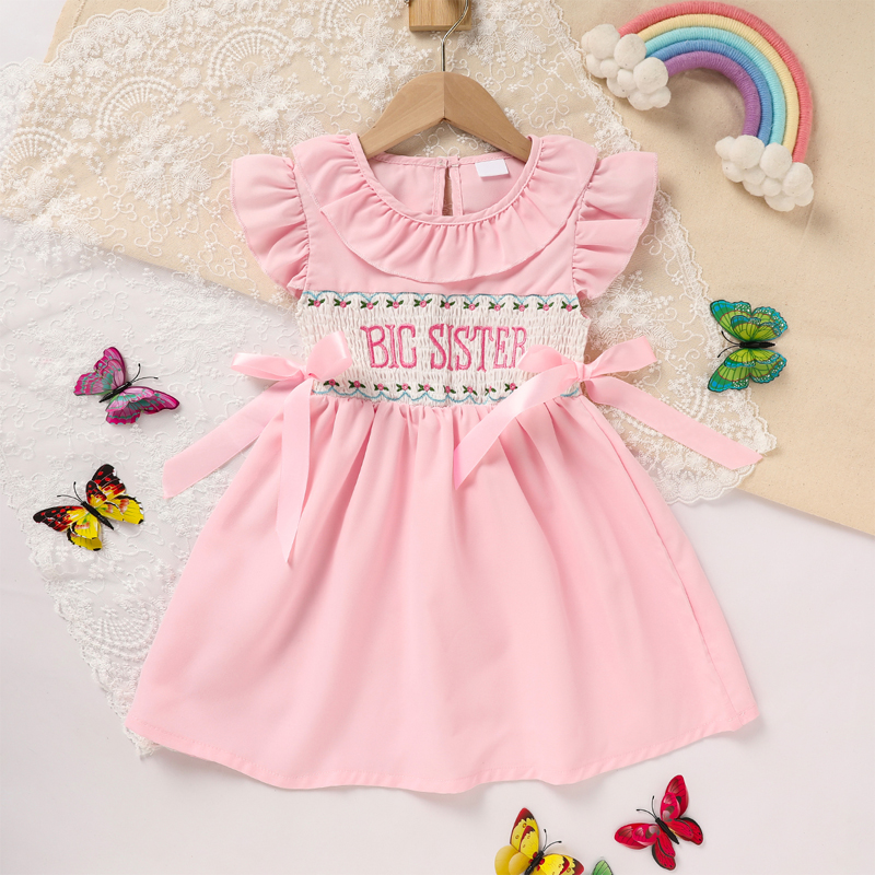 Robe fillette rose à manches volantées broderie lettres nœud