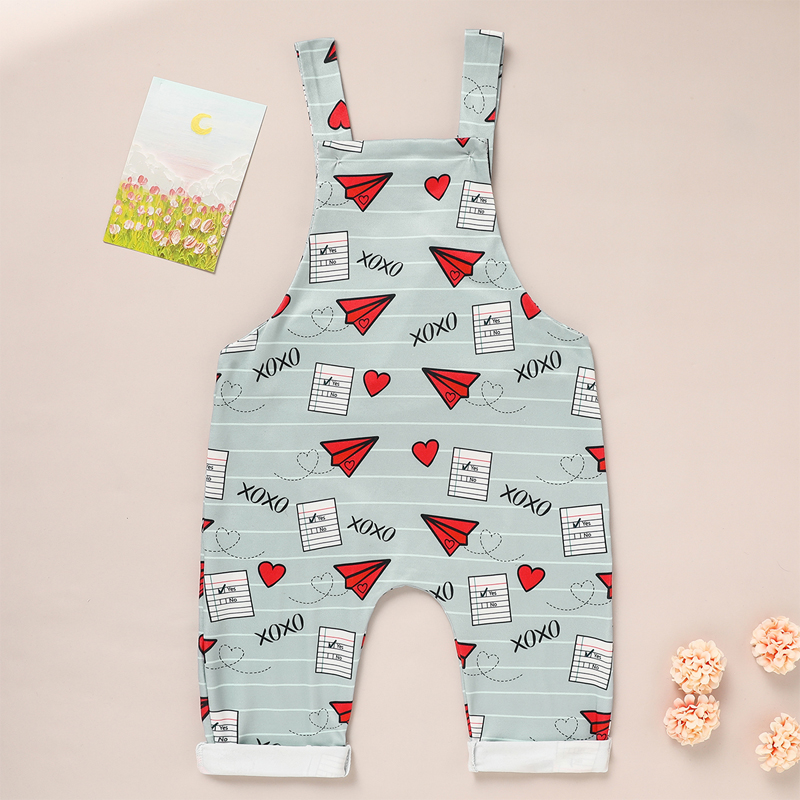 Salopette cœur et avion imprimés bébé