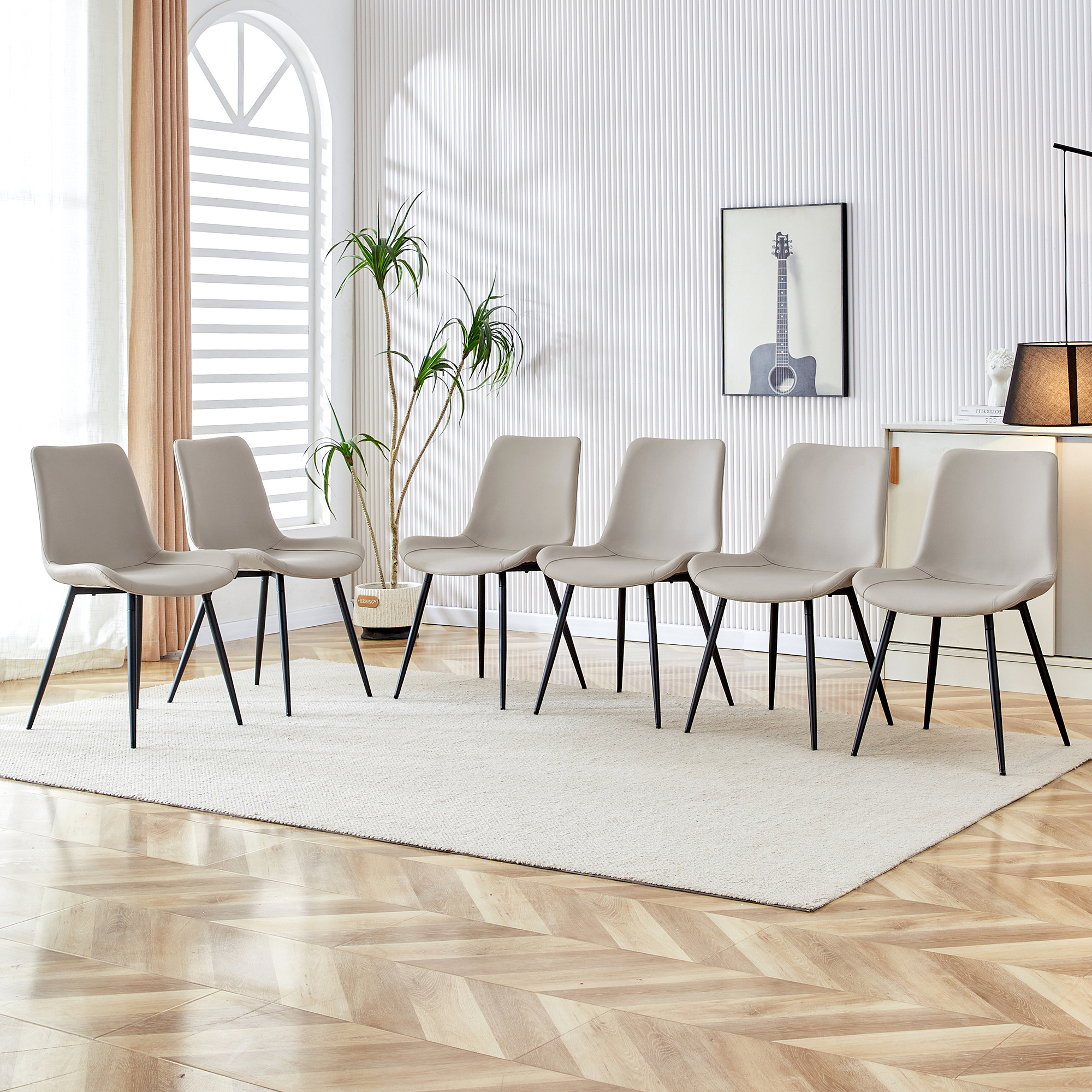 Chaise cuir gris pieds métal 6x design courbé