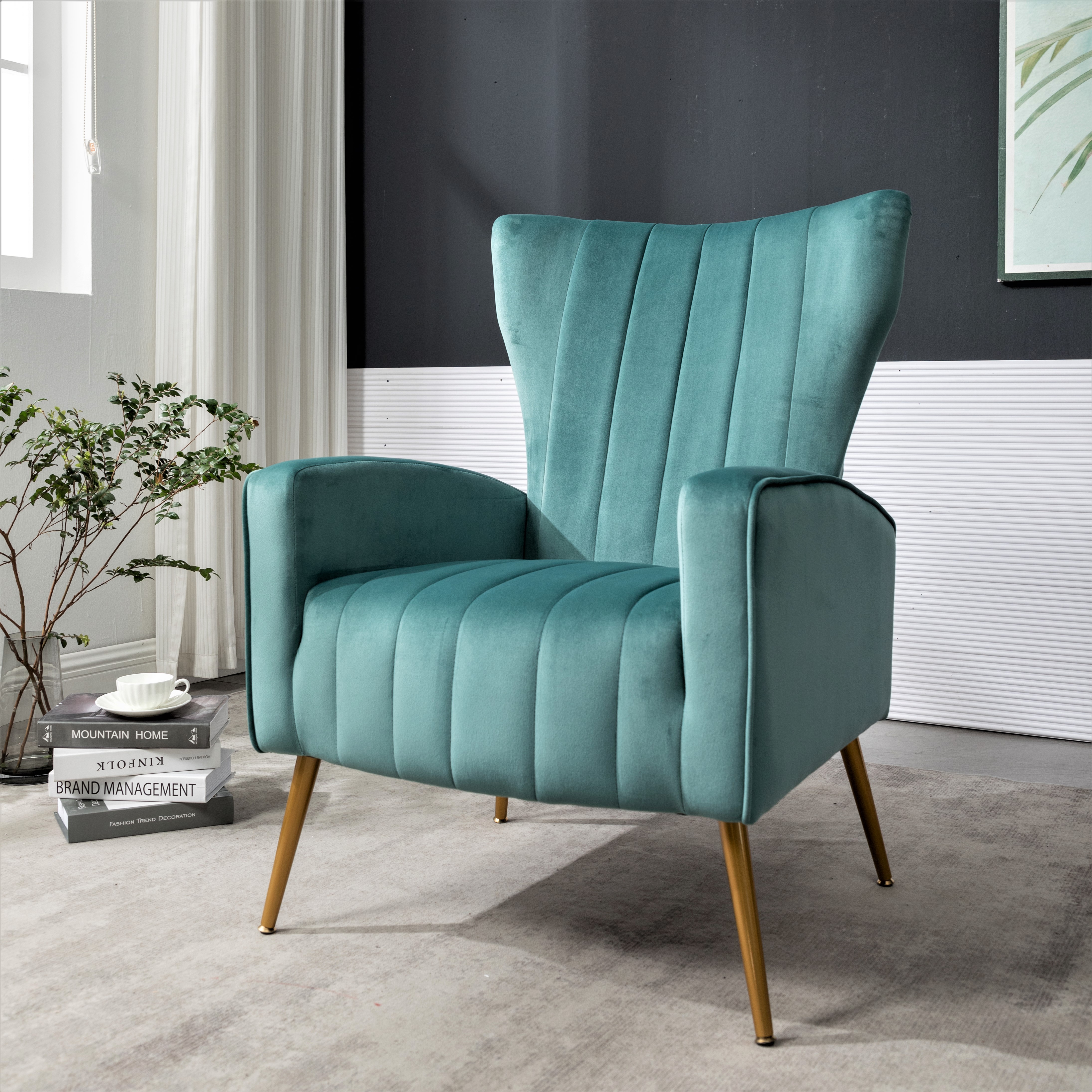 Fauteuil velours pieds métal, dossier ailé moderne
