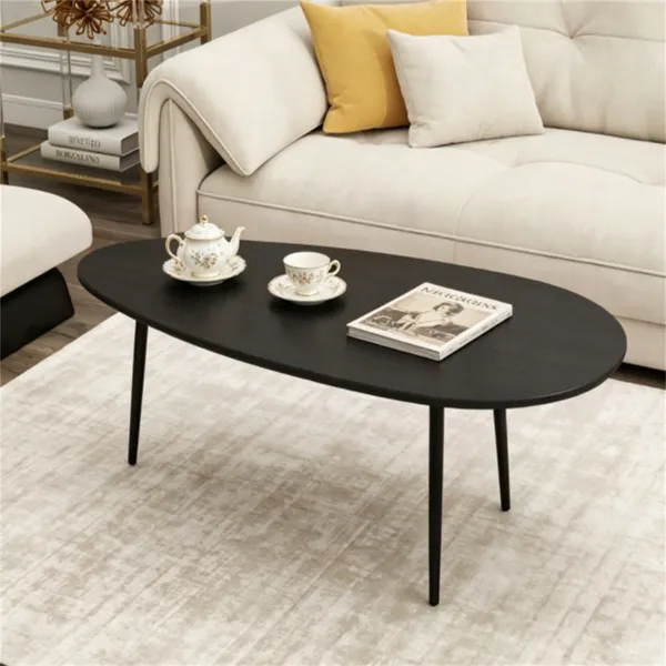 Table café noire base métal forme irrégulière