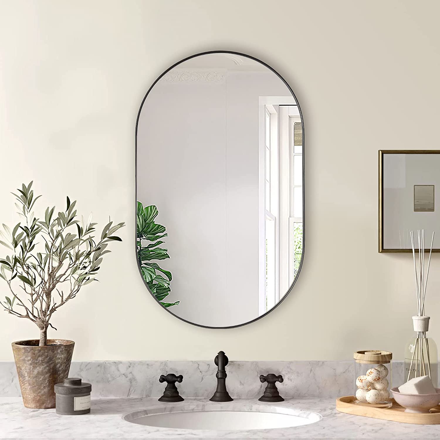 Miroir ovale métal noir 20x33 po