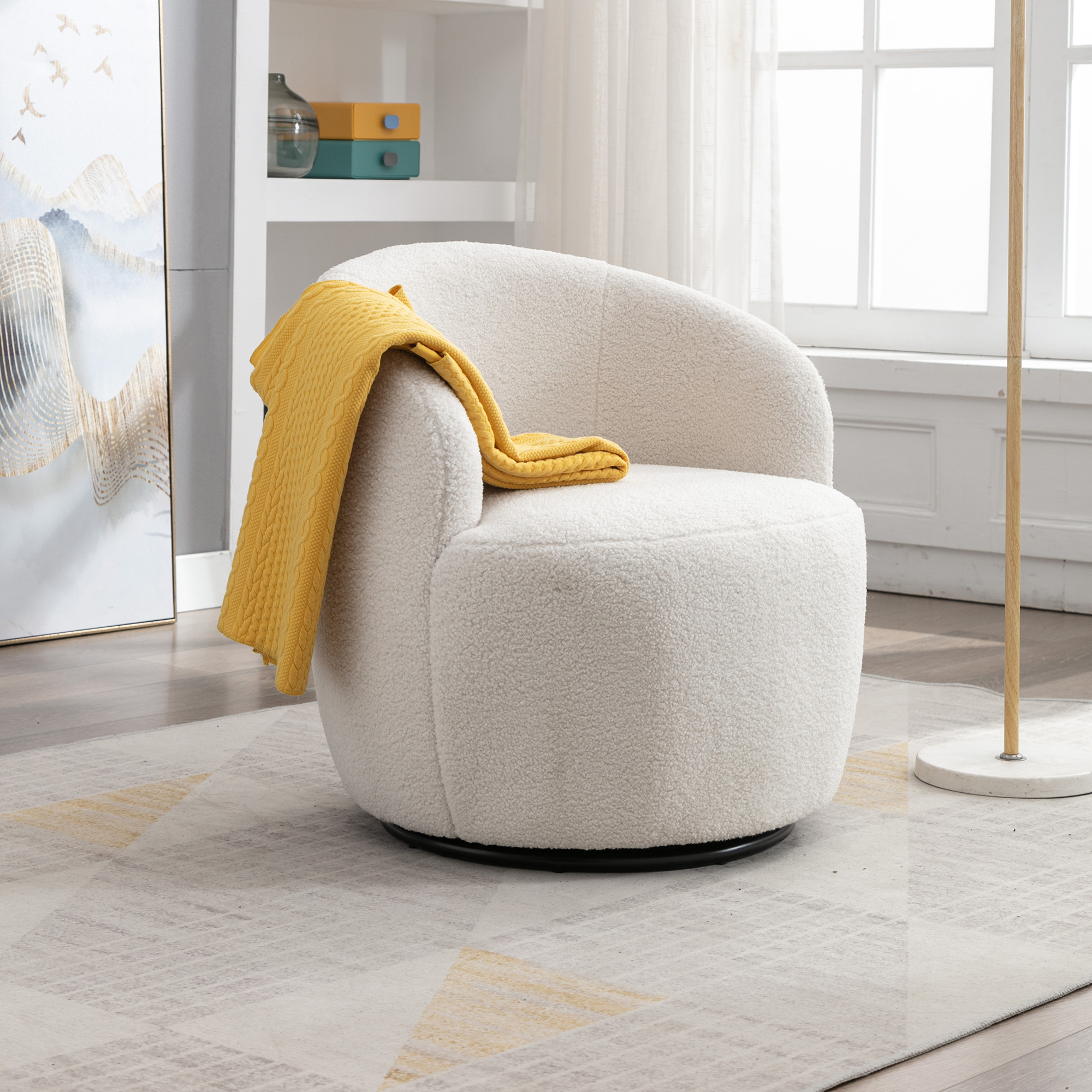 Fauteuil pivotant tissu teddy tonneaux noir ivoire anneau métal