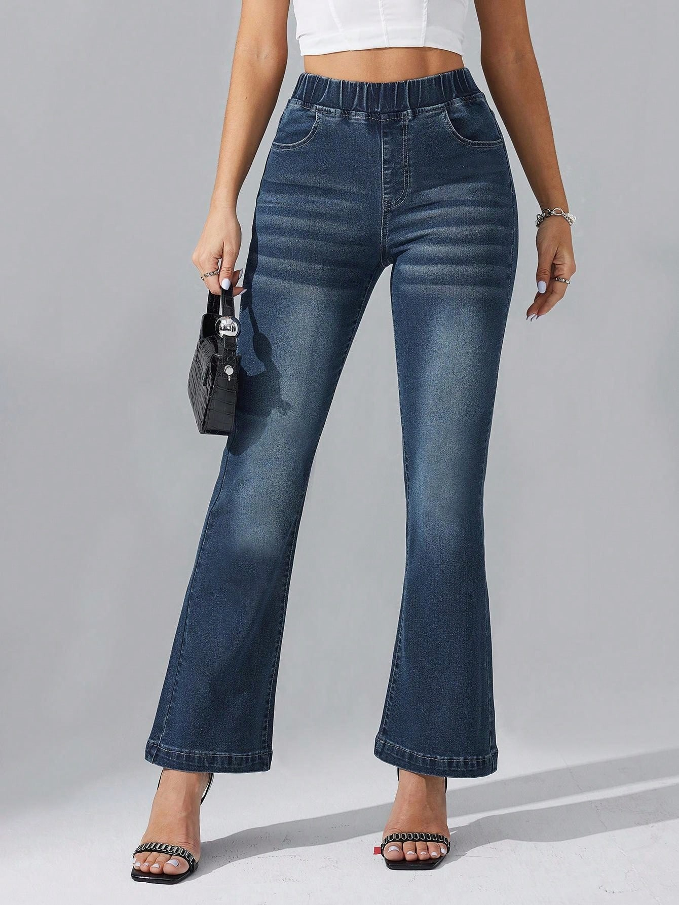 Jeans femme taille haute extensible patte d'éléphant slim