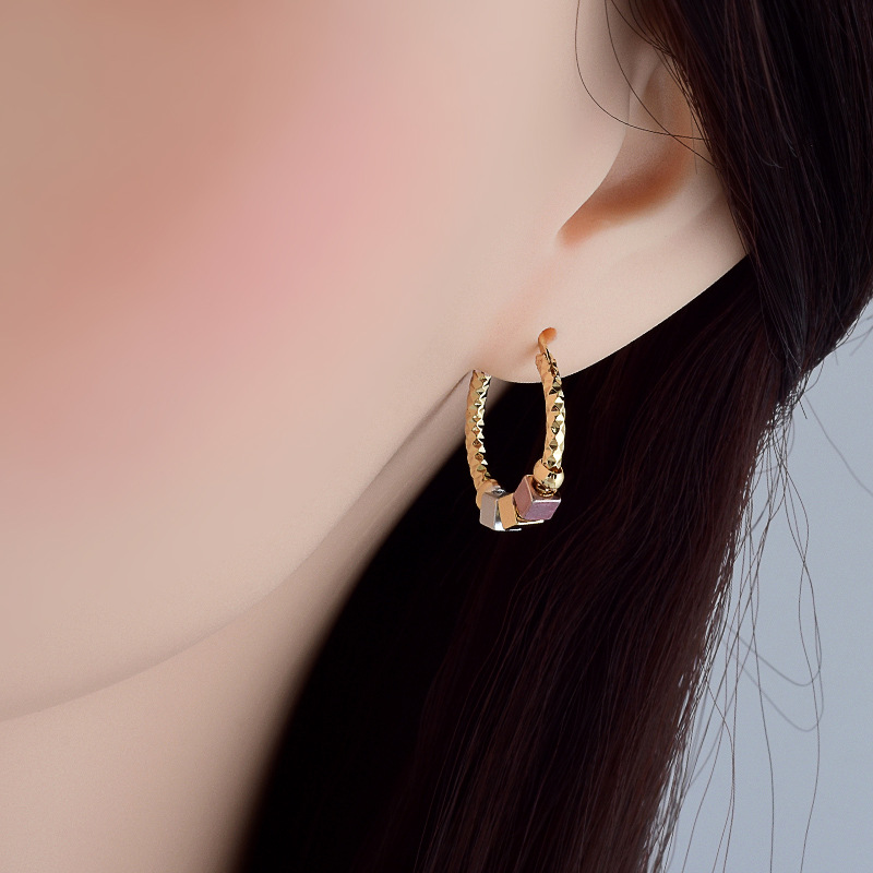 Boucles rosace creuse or contraste