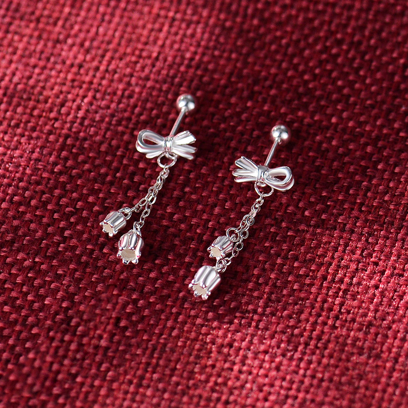 Boucles d'oreilles tassel os gland tempérament