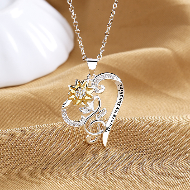 Collier chaîne clavicule tournesol cœur pastoral