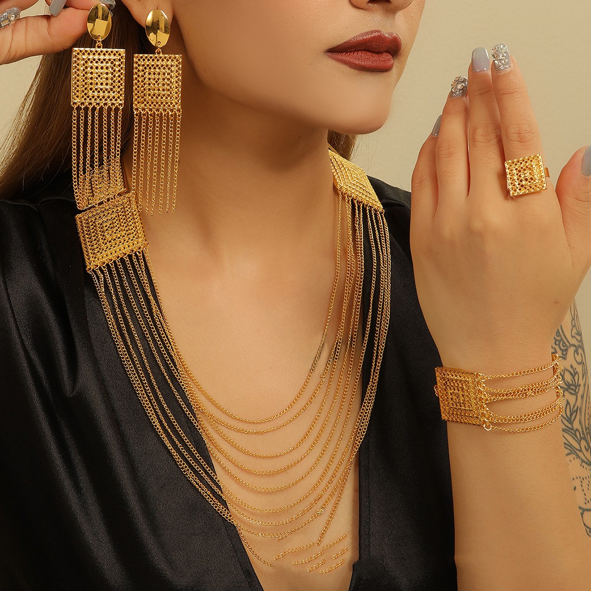 Ensemble collier long à gland double couche doré