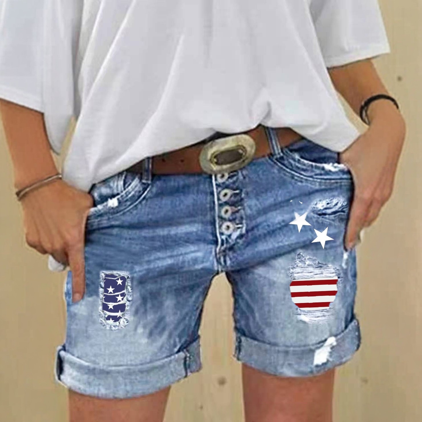Short denim stretch déchiré motif patchwork femme