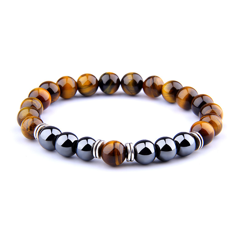 Bracelet oeil de tigre jaune style explosion avec séparateur obsidienne
